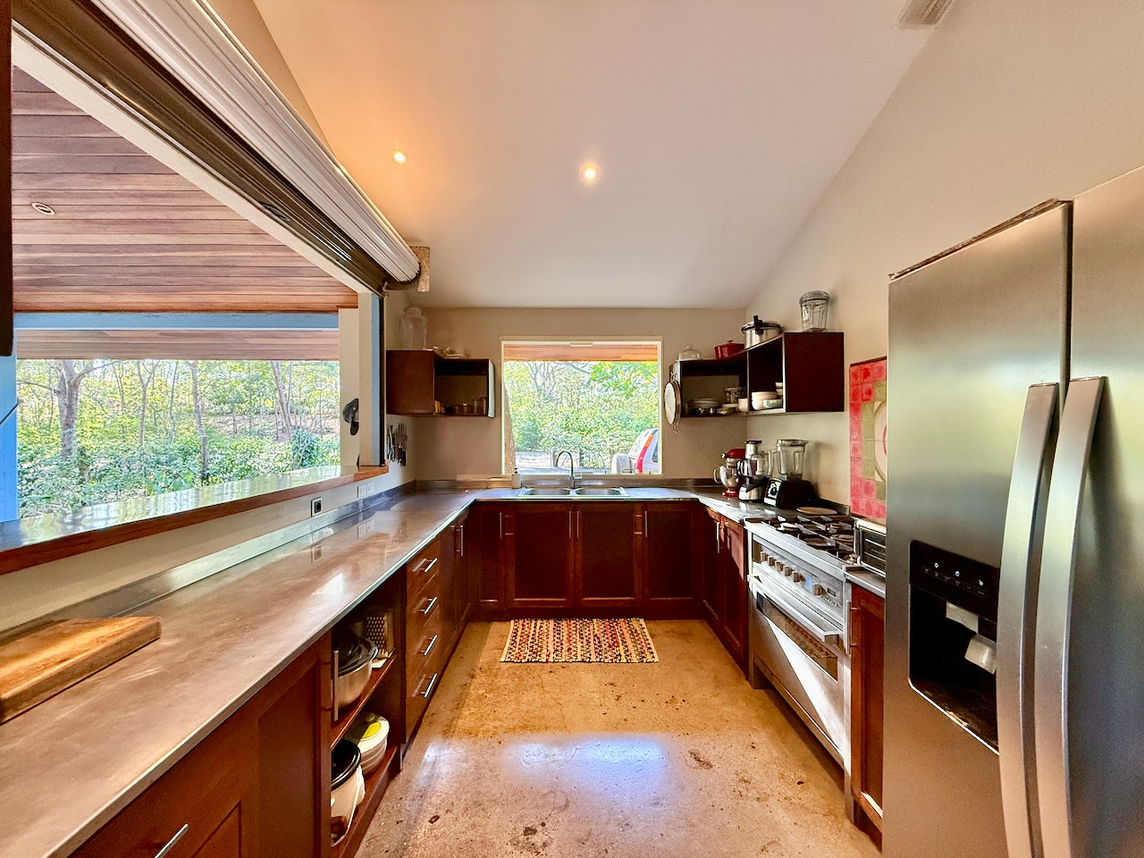 Kitchen with window overlooking greenery