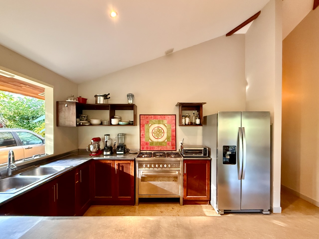 Kitchen with professional range and stainless appliances