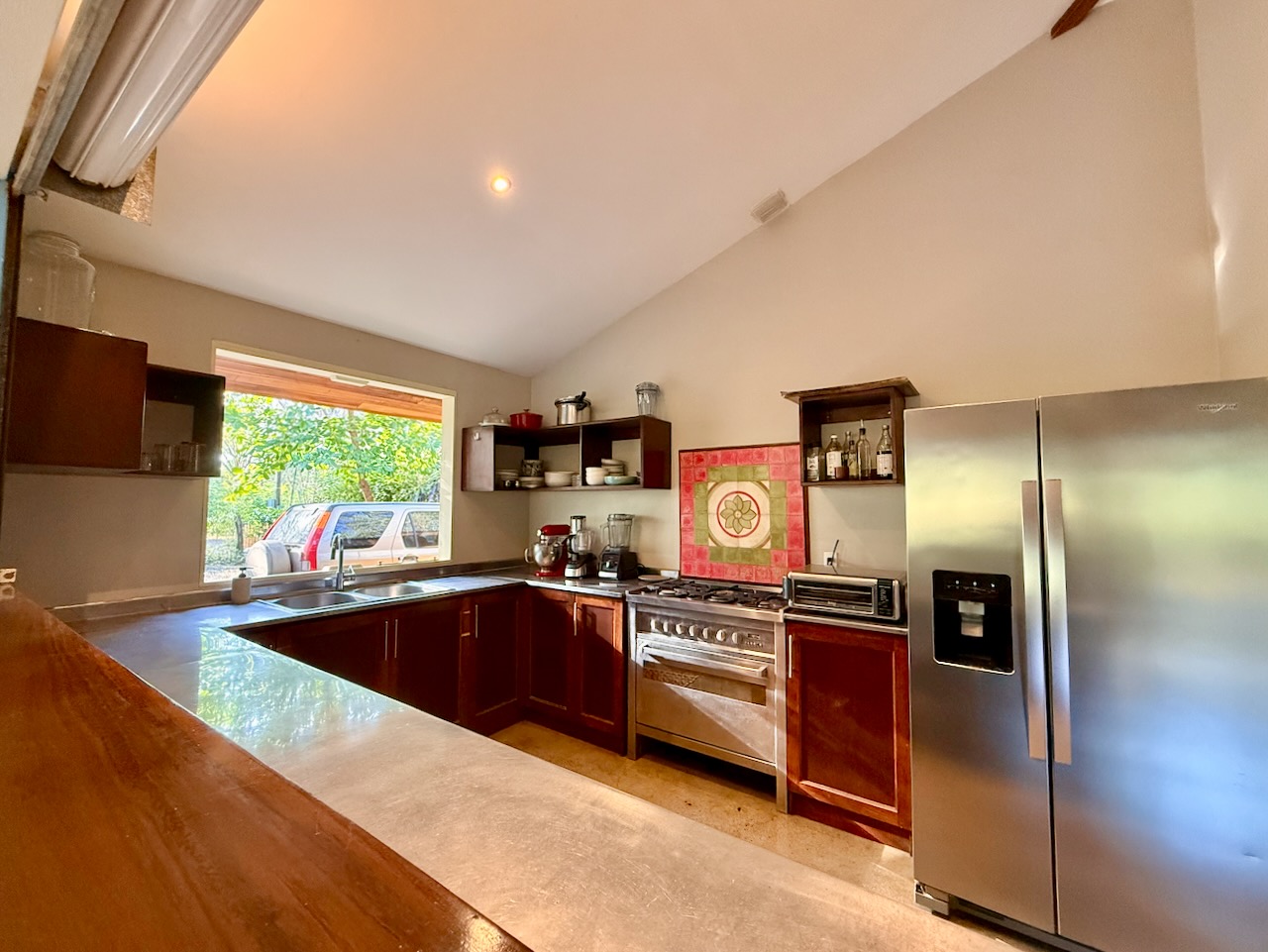 Kitchen with open shelving and countertops
