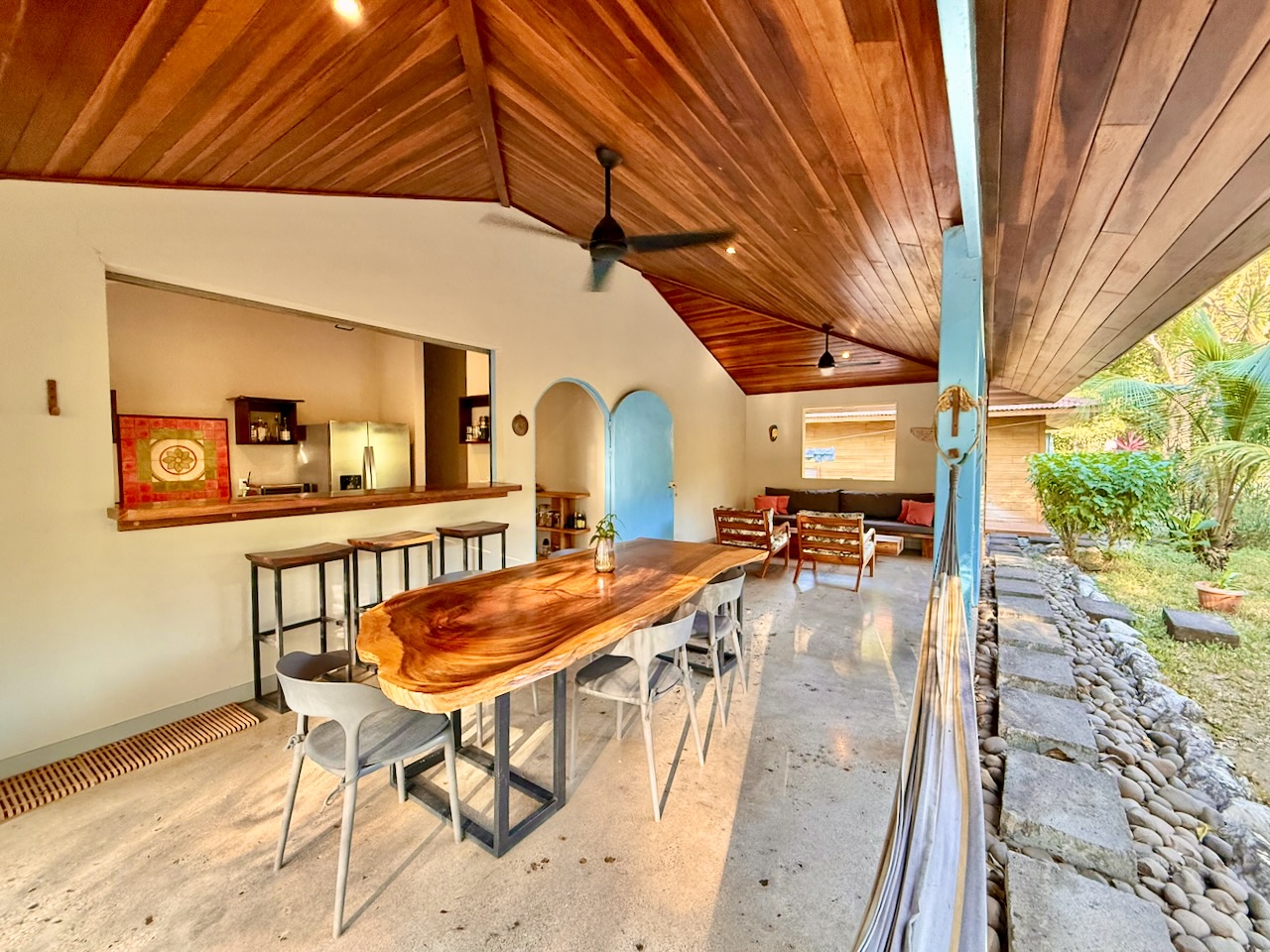Dining and bar area with wooden ceiling